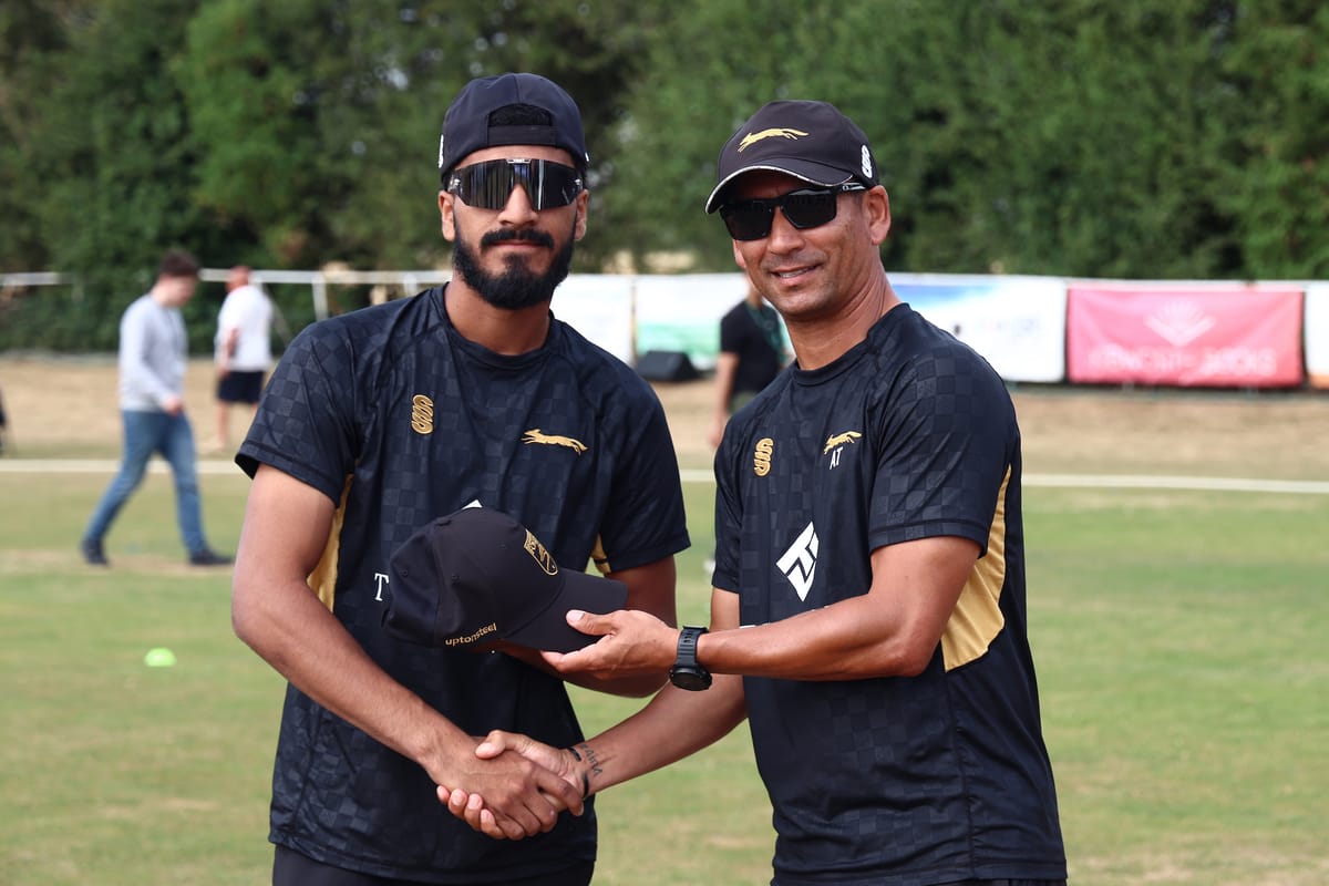 Leicestershire Head Coach Alfonso Thomas (right) presents Leicestershire Foxes Hamza Shaikh with his cap on debut before the Metro Bank 1 Day Cup Group A match between Leicestershire Foxes and Gloucestershire County Cricket Club at Kibworth Cricket Club, Kibworth, UK on 22 July 2026.