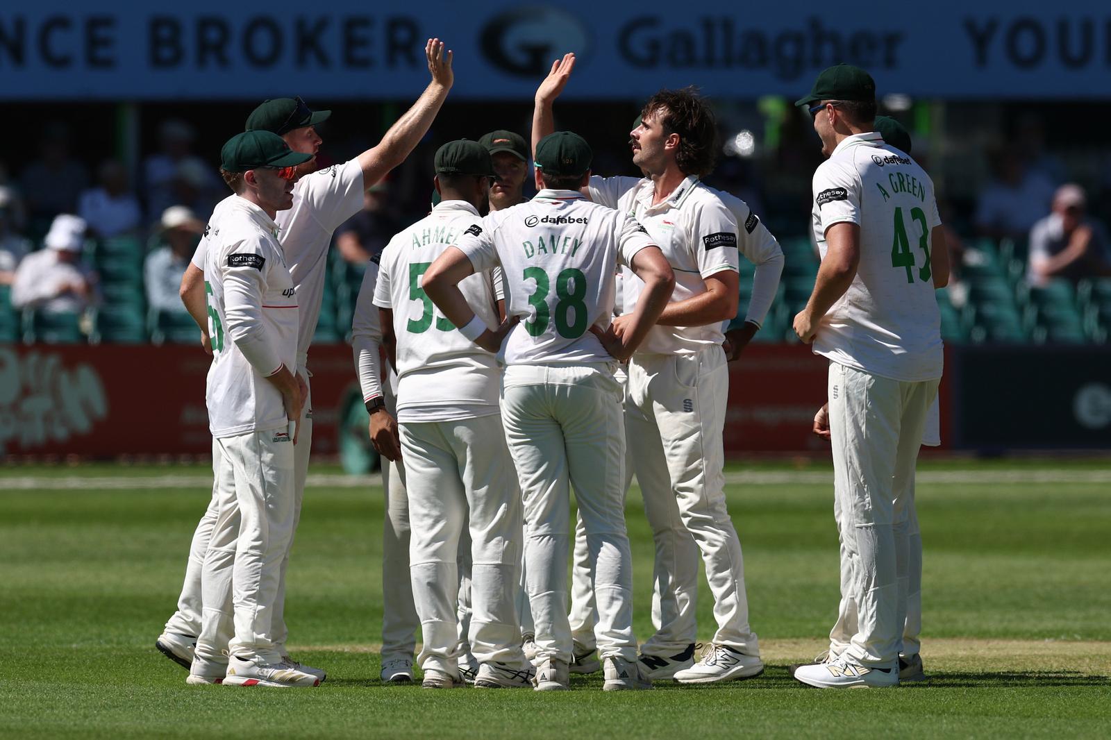 during Day One of the Rothesay County Championship One match between Leicestershire County Cricket Club and Yorkshire County Cricket Club at the Uptonsteel Grace Rd, Leicester, UK on 19 June 2026.aWICKET - Leicestershire's Ben Green is congratulated for trapping William Luxton during Day One of the Rothesay County Championship One match between Leicestershire County Cricket Club and Yorkshire County Cricket Club at the Uptonsteel Grace Rd, Leicester, UK on 19 June 2026.